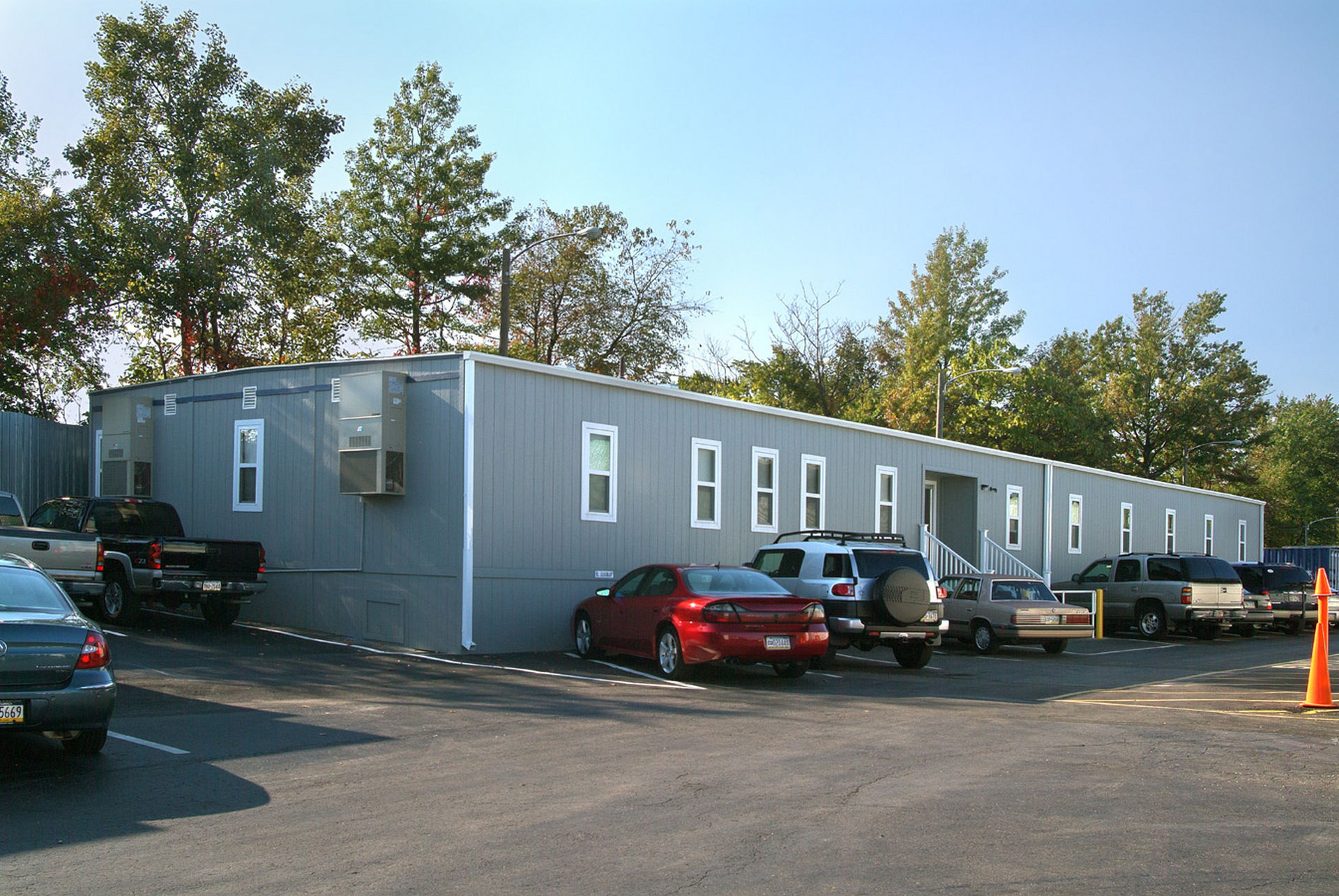 A parking lot in Pedricktown, NJ, showcasing modular construction in the surrounding area